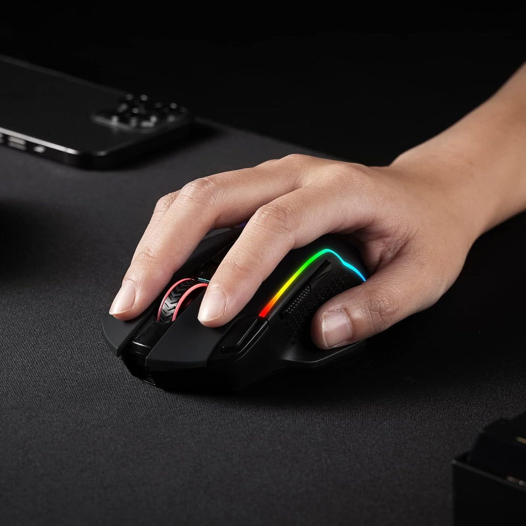 The wireless gaming mouse supports dual-mode wired/wireless connectivity and features 10,000 DPI and a "Fire" button.